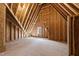 Unfinished attic space showing wooden framing and plywood walls, offering potential for future customization and expansion at 4501 Bartlett Dr, Raleigh, NC 27609