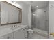 Elegant bathroom featuring a glass-enclosed shower and vanity at 4501 Bartlett Dr, Raleigh, NC 27609