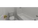 Bright bathroom featuring a tiled shower and toilet at 4501 Bartlett Dr, Raleigh, NC 27609