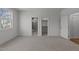 Bright bedroom offering a view of an ensuite and walk-in closet at 4501 Bartlett Dr, Raleigh, NC 27609