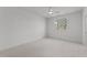 Bedroom with neutral paint, carpet flooring and a window at 4501 Bartlett Dr, Raleigh, NC 27609