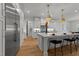 Chef's kitchen with a large center island, stainless steel appliances, and custom cabinetry at 4501 Bartlett Dr, Raleigh, NC 27609