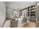 Inviting home office with custom built-ins, neutral color palette, and ample natural light at 4501 Bartlett Dr, Raleigh, NC 27609