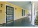 Welcoming front porch with a swing, complemented by classic columns and a charming entrance at 531 N Main St, Graham, NC 27253