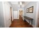Hallway featuring hardwood floors and neutral wall paint at 531 N Main St, Graham, NC 27253
