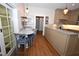 Updated kitchen featuring granite countertops, stainless appliances, and breakfast bar with seating at 531 N Main St, Graham, NC 27253