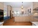 Bright eat-in kitchen with stainless steel appliances, granite countertops, and a cozy window seat at 531 N Main St, Graham, NC 27253