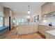 Updated kitchen features stainless steel appliances, granite countertops and lots of natural light at 531 N Main St, Graham, NC 27253