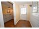 Bright laundry room with cabinets, countertop, and easy access to outside at 531 N Main St, Graham, NC 27253