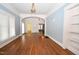 Open-concept living room showcasing gleaming hardwood floors at 531 N Main St, Graham, NC 27253
