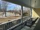 Relaxing porch swing offering serene outdoor views from the covered porch at 531 N Main St, Graham, NC 27253