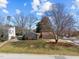 A lush front lawn with mature trees in a residential neighborhood at 5400 Cedarwood Dr, Raleigh, NC 27609