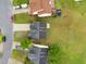 Aerial view of houses with paved driveway and green lawns at 6013 Shelane Ct, Raleigh, NC 27610