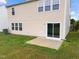 Backyard featuring vinyl siding, well-maintained lawn and a patio at 6013 Shelane Ct, Raleigh, NC 27610