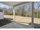 Covered back porch overlooking a spacious yard, perfect for outdoor relaxation at 624 Brittany Ct, Durham, NC 27703