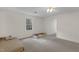 Bedroom featuring carpeted floor, window, ceiling fan, and closet at 6709 Windchase Dr, Rocky Mount, NC 27803