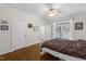 Bedroom with hardwood floors and direct access to bathroom and outdoor balcony at 6709 Windchase Dr, Rocky Mount, NC 27803
