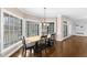 Dining area with lots of natural light from large windows and access to outdoor living at 6709 Windchase Dr, Rocky Mount, NC 27803