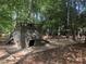 Charming playground with wooden structure, swings, and ample space for children to play and explore at 6709 Windchase Dr, Rocky Mount, NC 27803