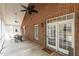 Spacious outdoor porch with a ceiling fan, table, and chairs at 6709 Windchase Dr, Rocky Mount, NC 27803