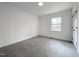 Comfortable bedroom with carpet, closet, and window providing bright, natural light at 7780 Brookdale Dr, Raleigh, NC 27616