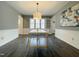 Well-lit dining room with stylish table, chairs, and elegant decor at 7780 Brookdale Dr, Raleigh, NC 27616