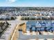 Aerial view of modern townhomes within a well-planned community featuring beautifully landscaped surroundings and neighborhood streets at 8401 Zinc Autumn Path Path, Raleigh, NC 27615