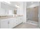Bathroom with double sinks, granite counters, and glass shower at 8401 Zinc Autumn Path Path, Raleigh, NC 27615