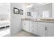 Bright bathroom with double sinks and granite countertops at 8401 Zinc Autumn Path Path, Raleigh, NC 27615