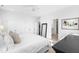 Bright main bedroom features a ceiling fan, closet, and ensuite bath at 8401 Zinc Autumn Path Path, Raleigh, NC 27615
