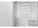 Organized walk-in closet with custom shelving at 8401 Zinc Autumn Path Path, Raleigh, NC 27615