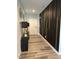 Inviting hallway with striking accent wall and stylish decor at 94 Aylebury Rdg, Zebulon, NC 27597
