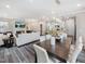Open concept living space showcasing dining area and inviting living room at 1008 Sora Way, Durham, NC 27703