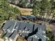 Stunning aerial view of the home showcasing its architectural details and manicured landscaping at 10115 Mizner Ln, Raleigh, NC 27617