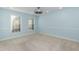 Bright bedroom featuring two large windows that provide natural light at 10115 Mizner Ln, Raleigh, NC 27617