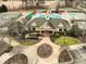 Aerial view of the community center with pool, water slide, and open green spaces at 10115 Mizner Ln, Raleigh, NC 27617