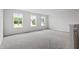 Spacious bonus room features neutral carpet and multiple windows at 108 Grove Township Way, Angier, NC 27501