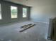 A large upstairs room filled with natural light is ready to be personalized to fit your lifestyle at 108 Grove Township Way, Angier, NC 27501