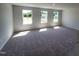 Bonus room featuring carpet flooring and natural lighting from large windows at 108 Grove Township Way, Angier, NC 27501