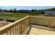 New wooden deck overlooking a green field in a new development at 108 Grove Township Way, Angier, NC 27501