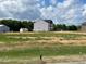 Side view of new construction home in new community at 108 Grove Township Way, Angier, NC 27501