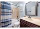 Cozy bathroom featuring a shower and tub combination with decorative tile surround at 1137 Fanning Dr, Wake Forest, NC 27587
