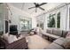 Cozy screened porch featuring comfortable seating and an open-air feel with wooded views at 1137 Fanning Dr, Wake Forest, NC 27587