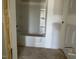 Bathroom area with a shower and primed walls at 119 Grove Township Way, Angier, NC 27501