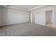 Large bedroom with an ensuite bathroom and nearby door to another room at 119 Grove Township Way, Angier, NC 27501