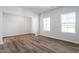 Spacious living room with laminate flooring and lots of natural light at 119 Grove Township Way, Angier, NC 27501