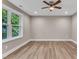 A bedroom featuring hardwood floors, recessed lighting, and a ceiling fan at 1521 Chapel Hill Rd, Durham, NC 27701
