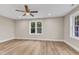 A bedroom featuring hardwood floors, recessed lighting, and a ceiling fan at 1521 Chapel Hill Rd, Durham, NC 27701