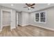 A bedroom featuring hardwood floors, recessed lighting, closet, and a ceiling fan at 1521 Chapel Hill Rd, Durham, NC 27701