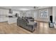 Open floor plan features a modern living room with hardwood floors, a dining area, and a bright kitchen at 1521 Chapel Hill Rd, Durham, NC 27701